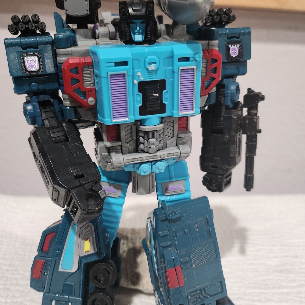 Hasbro Transforming Robot Action Figure - Blue, Black, and Red